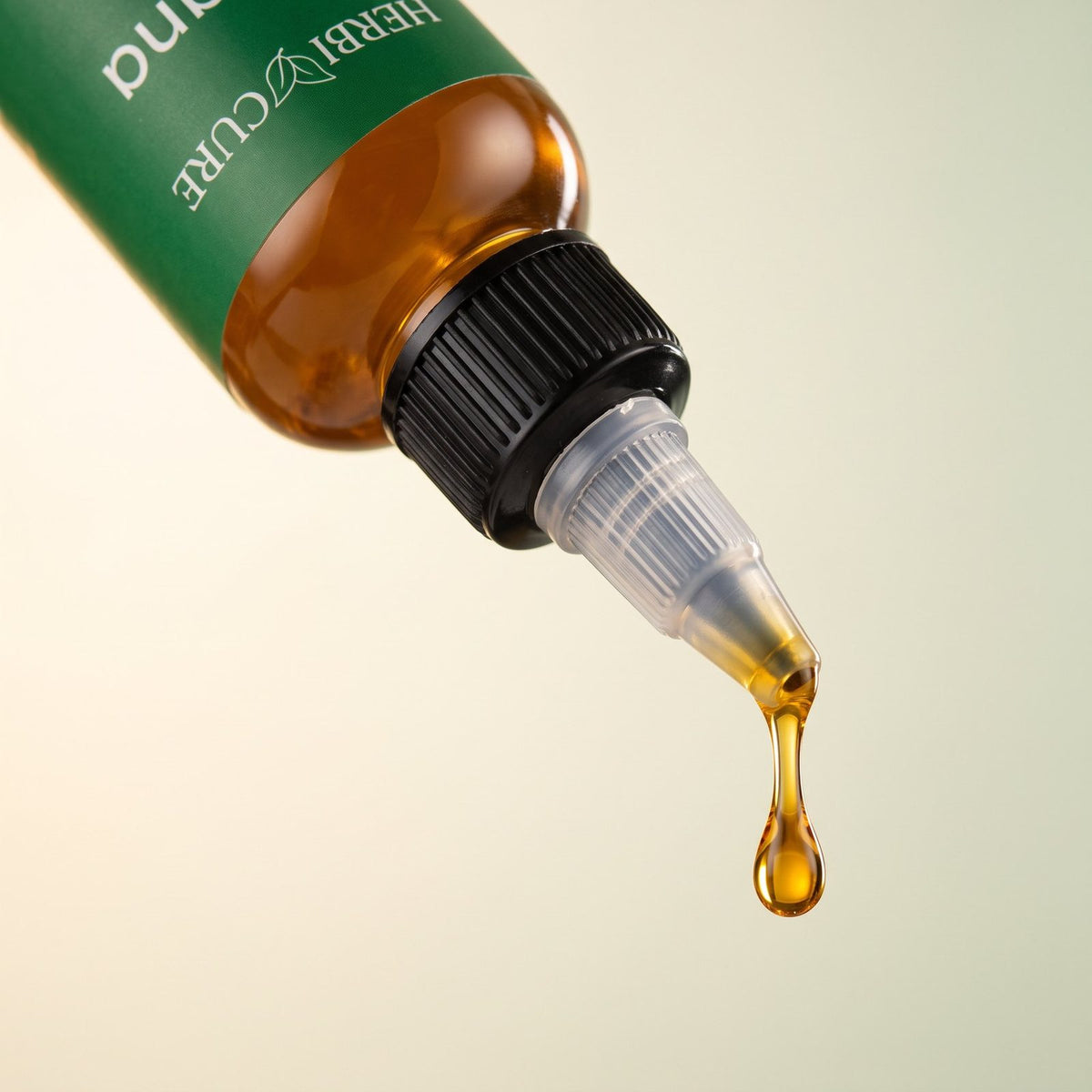 Precision nozzle with a drop of batana oil